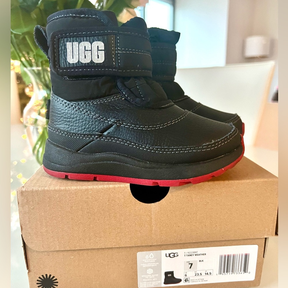 Ugg boots toddler size 7. Black + red trim. Like new.original box. Style T Taney